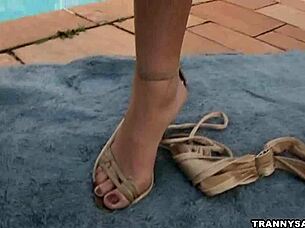 busty latina shemale strokes huge cock poolside in solo masturbation