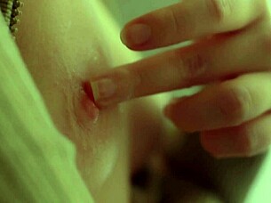 wanna watch this cute blonde tease her nipples and pussy close up?