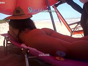 Ebony massages busty wife on beach leading to anal tease