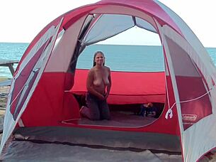 Milf housewife teases at the beach