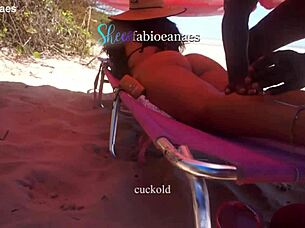 Ebony massages busty wife on beach leading to anal tease