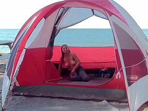 Milf housewife teases at the beach