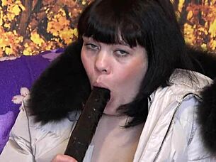 Milf Sucks Big Dildo in Fur-Trimmed Hood Coat Fetish