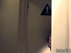 cali sweets slurps white cock through glory hole interracial style