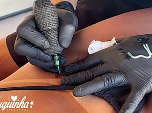 brazilian tattooed girl pays tattoo artist smoothly