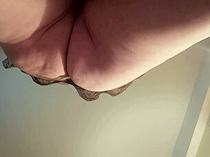 Wet milf slut masturbates with dildo till explosive squirt close-up