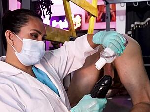 nurse domina stretches patient in anal exam