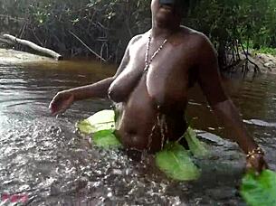 busty african grinds thick ass ebony curves in ritual waters