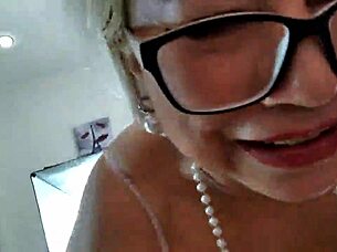 depraved mature milf blonde spreads wet shaved pussy wide