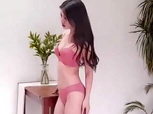 Korean bikini model poses sexy in steamy photoshoot session