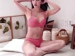 Korean bikini model poses sexy in steamy photoshoot session