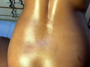 ebony lesbians squirt wildly on oiled strapon during intense pussy fucking