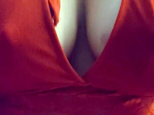 blonde slips into red lingerie showing off her big tits