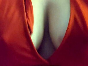 blonde slips into red lingerie showing off her big tits
