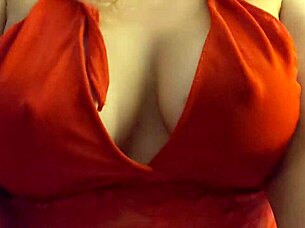 blonde slips into red lingerie showing off her big tits
