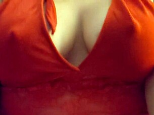 blonde slips into red lingerie showing off her big tits