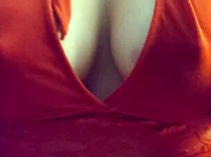 blonde slips into red lingerie showing off her big tits