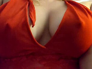 blonde slips into red lingerie showing off her big tits
