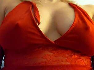 blonde slips into red lingerie showing off her big tits
