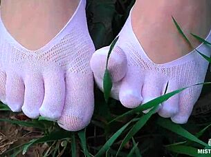 goddess's cute white socks feet tease in jeans on spring grass outdoors 👣😍