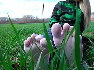 goddess's cute white socks feet tease in jeans on spring grass outdoors 👣😍