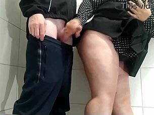 Gorgeous milf's public toilet handjob drives me wild with lust