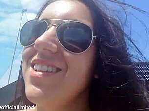 Naughty brunette flashes small tits pussy from topless sports car publicly