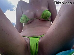 italian milf flashes big tits wet shaved pussy beach bikini