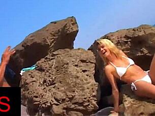 blonde slut takes anal pounding between beach rocks creampie