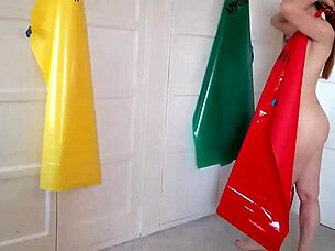 hey check out this mature woman rocking a pvc apron for her quirky fetish play