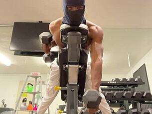 ripped athlete flexes biceps to hoist skinny babe during outdoor workout sex