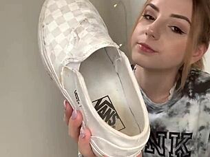 Serbian girl slips off sneakers revealing bare feet