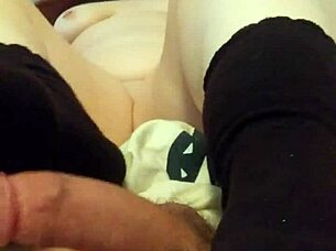 chubby girl strokes huge cock in socks foot fetish play