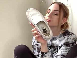 Serbian girl slips off sneakers revealing bare feet