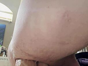 woman stretches ass with double dildo anal penetration