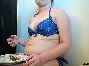 Teen dives into messy cake eating fun