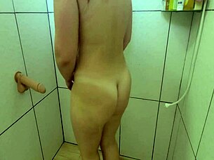 Curvy Brazilian milf Sophie Helenass showers with huge tits big ass flashing