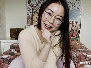 ersties cute chinese babe glasses super happy masturbatin shaved pussy vibrator clit spread