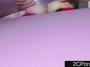 busty young brunette takes mystery man through gloryhole