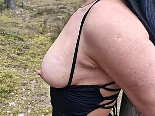 Handcuffed milf on the tree in public forest and fucking her good