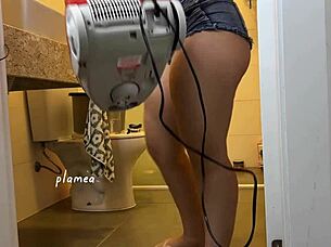 Girl in mini shorts cleans while looking super sexy