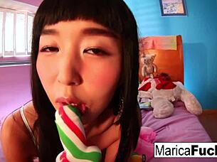 Marica hase plays with candy cock in her pussy