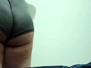 brazilian guy shakes his big ass against the wall