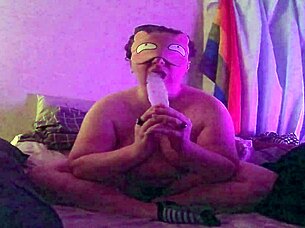 old chubby babe sucks dildo