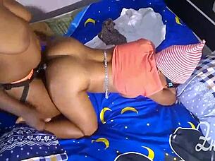 Zainab and blacka share passionate lesbian kisses and strap on play