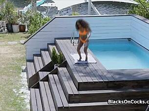 Black bikini bombshell rides thick interracial cock hard