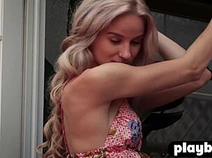 petite blonde poses and strips naked