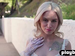 Tiny blonde teen strips in garden