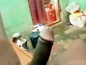 indian aunty gives handjob to young guy at home