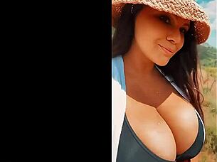 busty bombshell enjoys spring outdoor scene